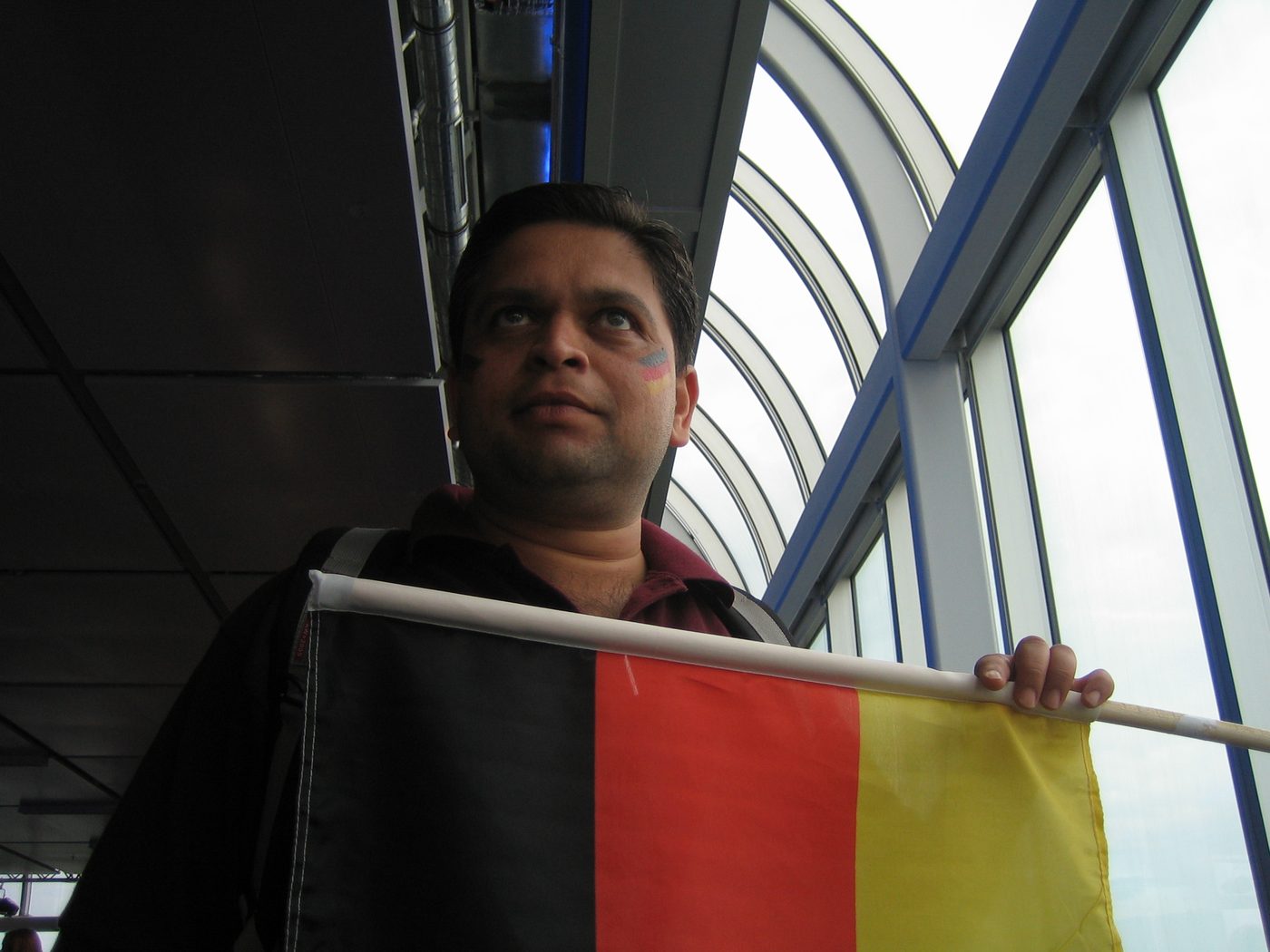 Manish Thatte with a German flag and flag face-paint, 8 July 2006